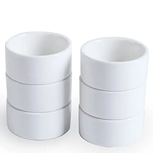 Set of six very small white porcelain ramekin bowls